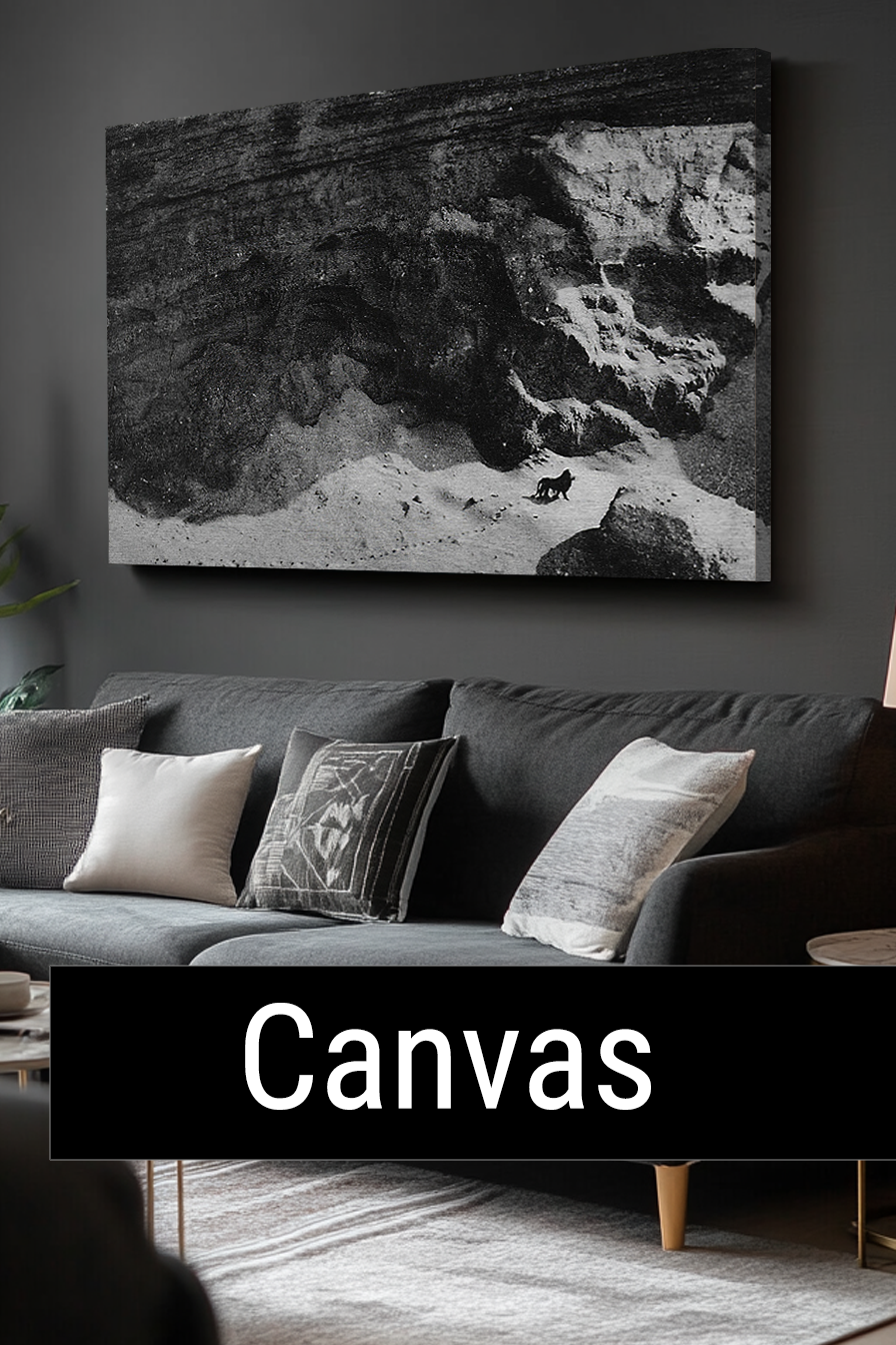 a living room with a couch and a painting on the wall